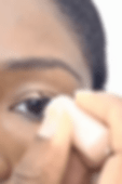 Mark the center of the eyelid with the liquid eyeliner